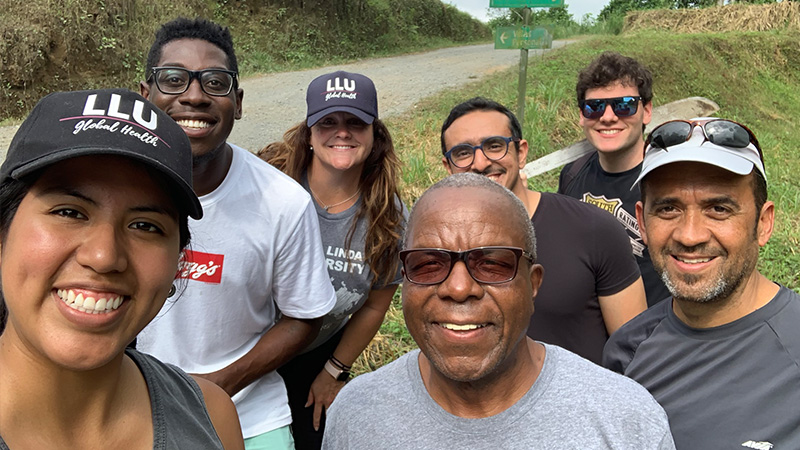 Staff praying together