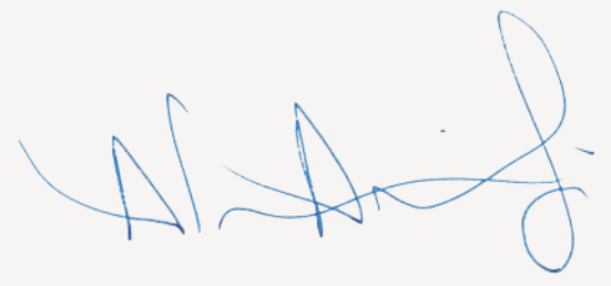 blue ink on light brown background of signature