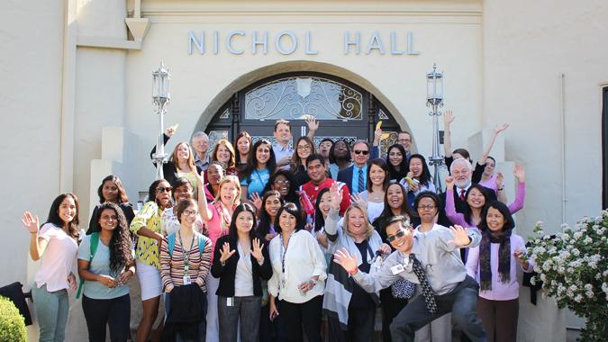 Students smiling outside Nichols Hall